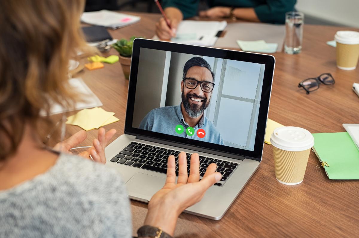 woman meeting with a man virtually